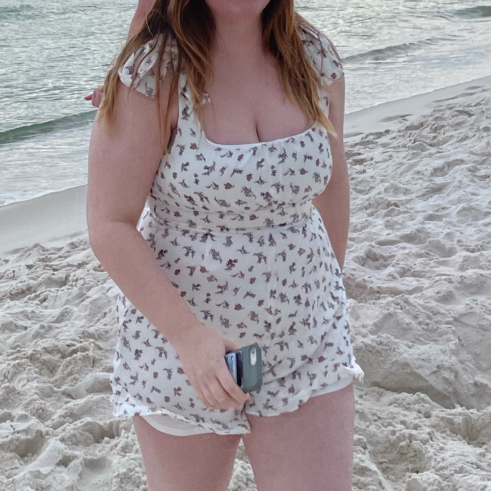 Francesca’s Cream Floral Romper